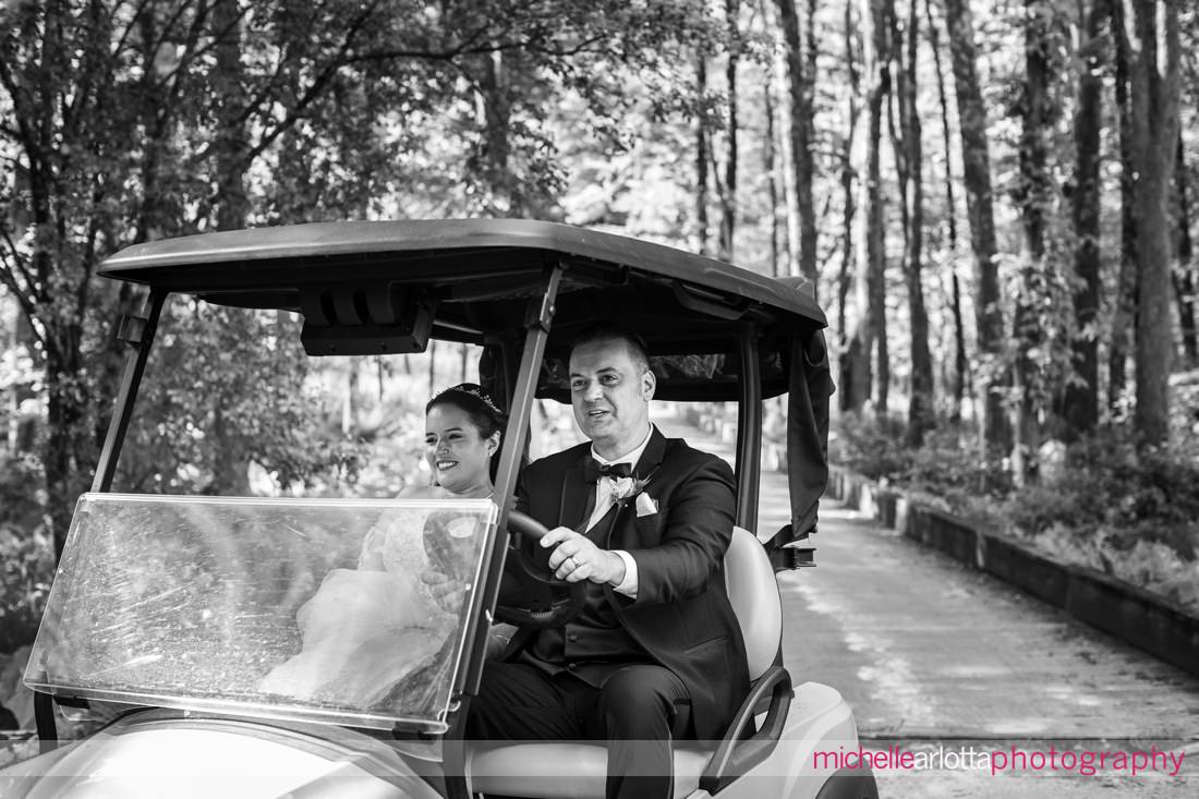 Venue at Winding Hills golf club wedding Hudson valley ny wedding bride and groom portrait in gold cart