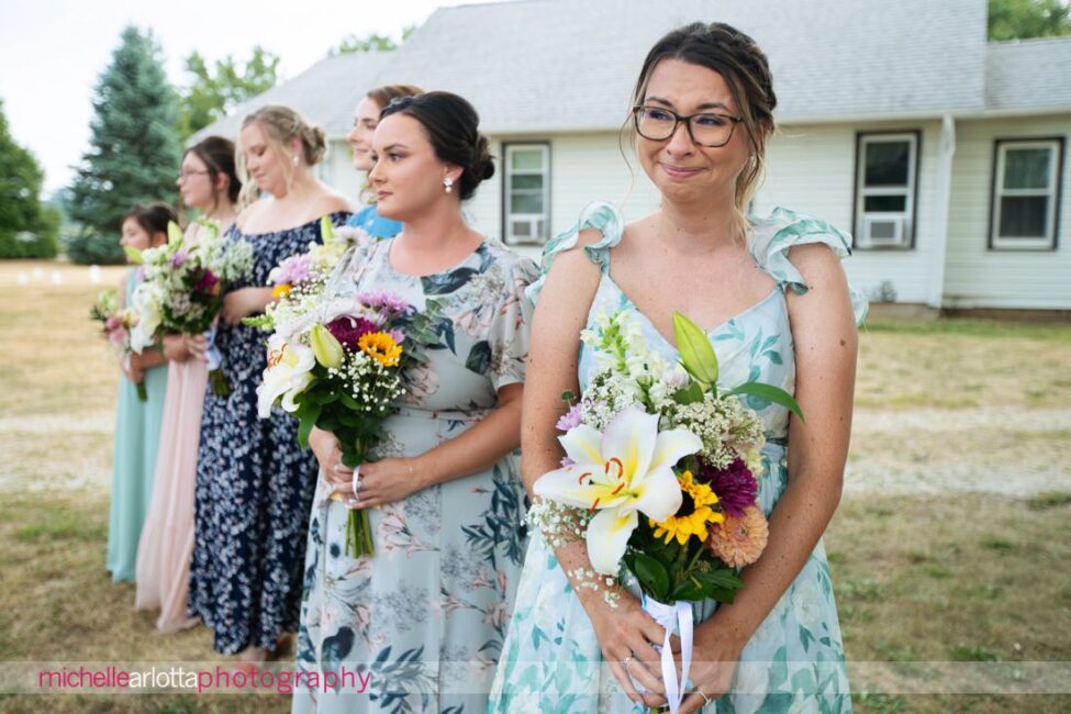 South Jersey Hammonton Backyard wedding ceremony maid of honor tearing up as bride walks down the aisle