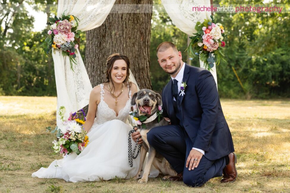 South Jersey Hammonton Summer Backyard wedding bride and groom with dog