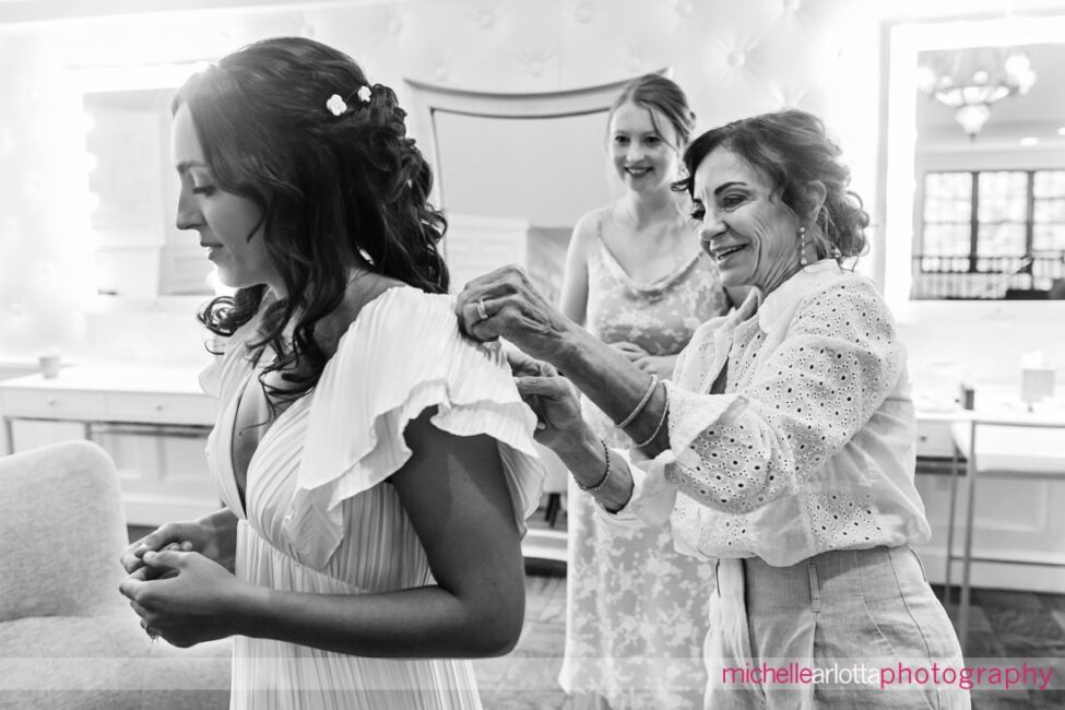 Landmark Venue Hotel Du Village New Hope PA bride's mother helping with dress