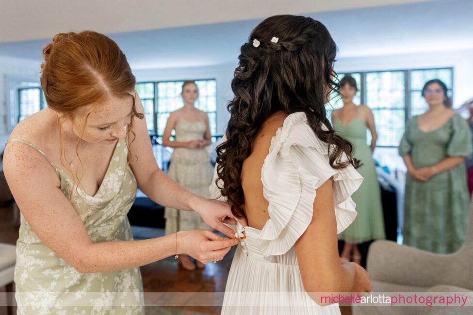 Landmark Venue Hotel Du Village New Hope PA maid of honor helping with dress