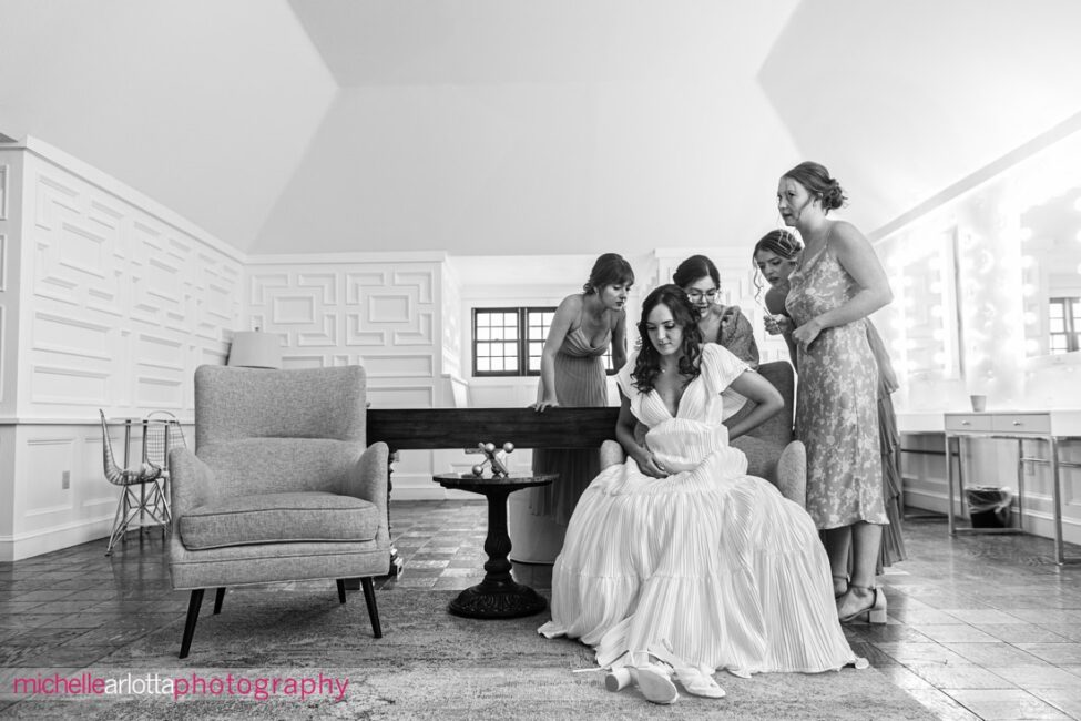 Landmark Venues Hotel Du Village New Hope PA bride sitting with bridesmaids around