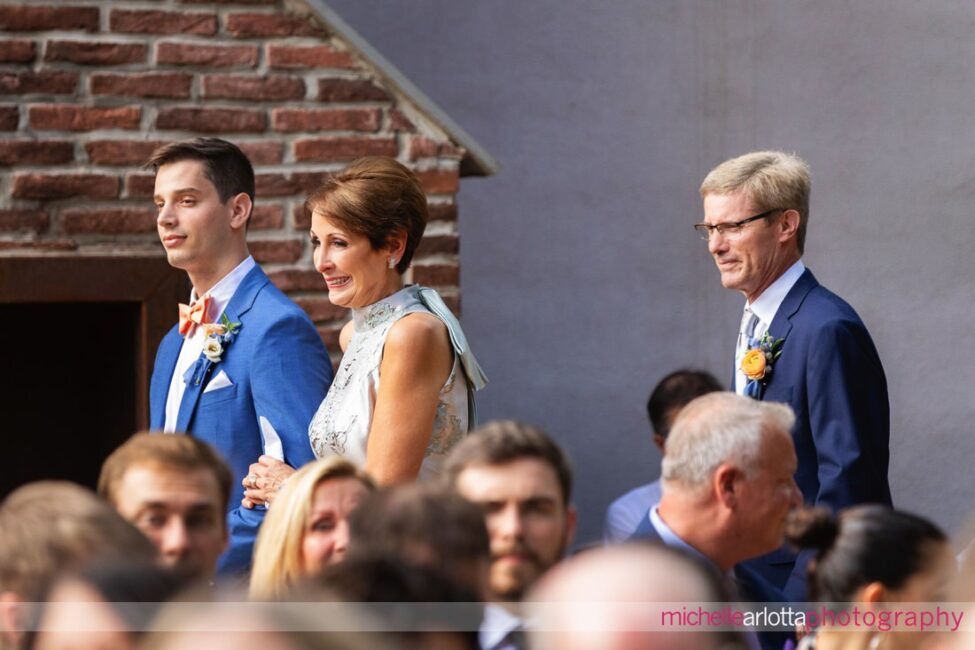 Hotel Du Village New Hope outdoor wedding ceremony groom walking down aisle with parents