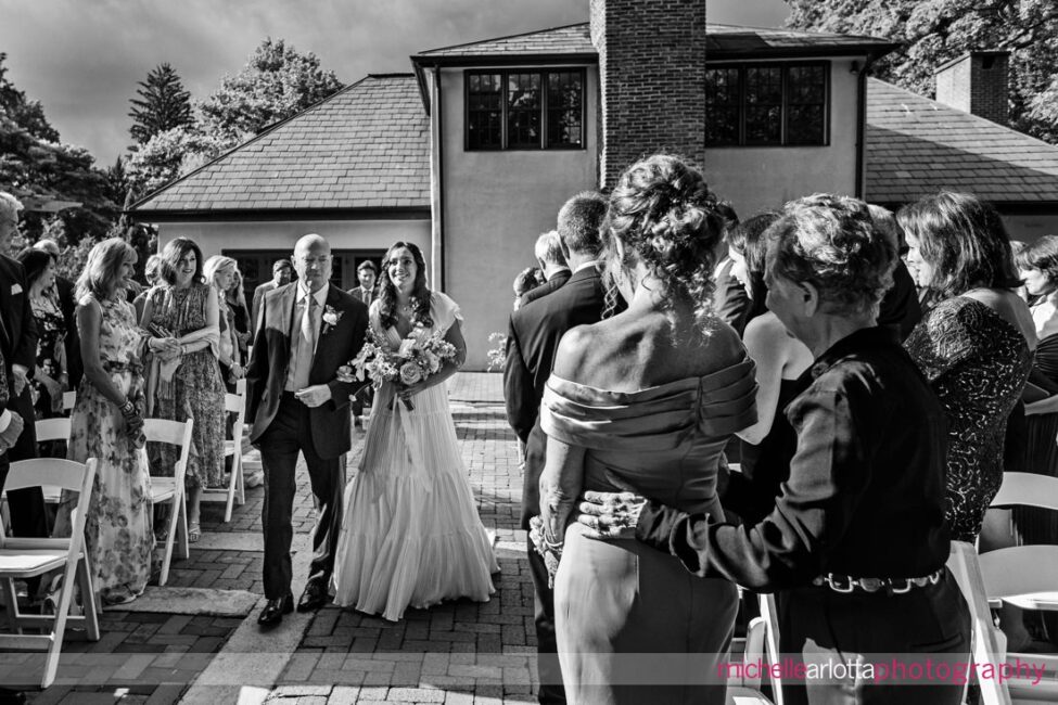 Landmark Venues Hotel Du Village New Hope PA outdoor wedding ceremony bride walking down the aisle as mother watches