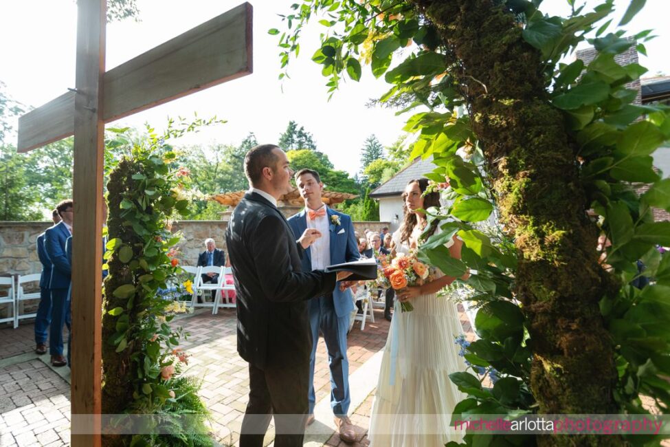 Landmark Venues Hotel Du Village New Hope PA outdoor wedding ceremony cross in the foreground