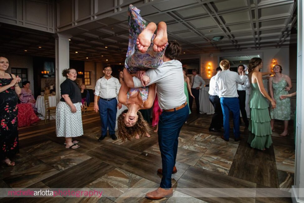 Landmark Venues Hotel Du Village New Hope PA wedding reception girl flipping in the air