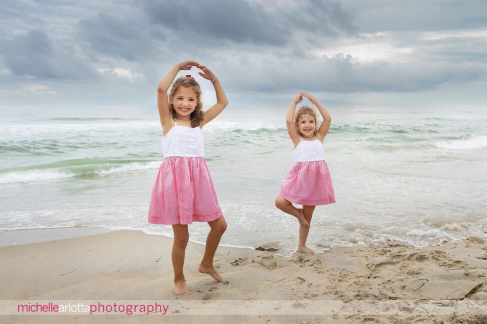 beach haven lbi family session two little girls doing ballerina poses