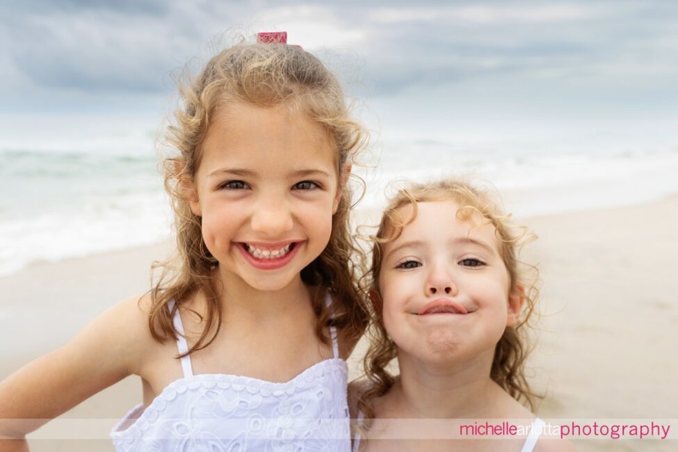 beach haven lbi nj family portrait session sisters smiling for the camera