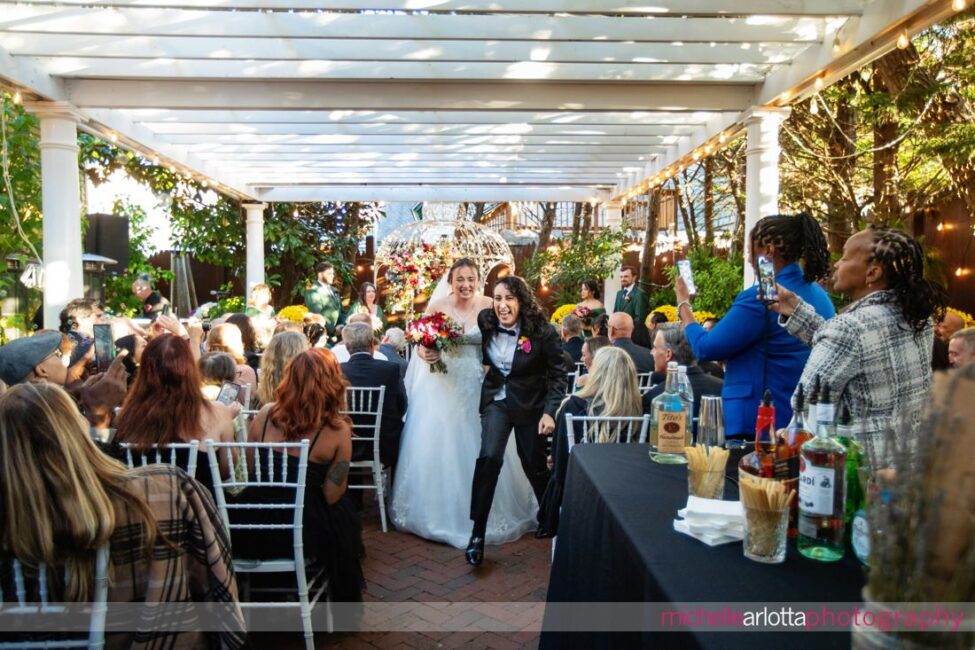 late fall outdoor garden wedding ceremony Gables LBI NJ bride and bride exit the ceremony