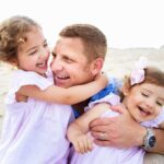 dad with two daughters lbi beach family