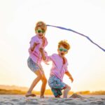 two brothers play on the beach in NJ