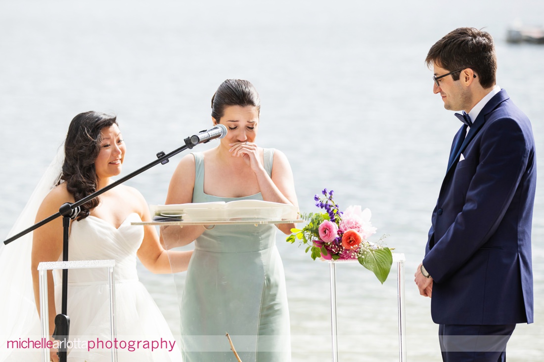 groom's sister becomes emotion during speech at NJ lakeside wedding ceremony