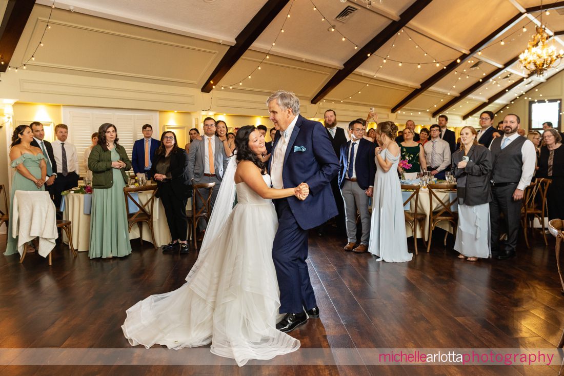 bride dances with father at Lake Mohawk Country Club spring lakeside wedding reception NJ