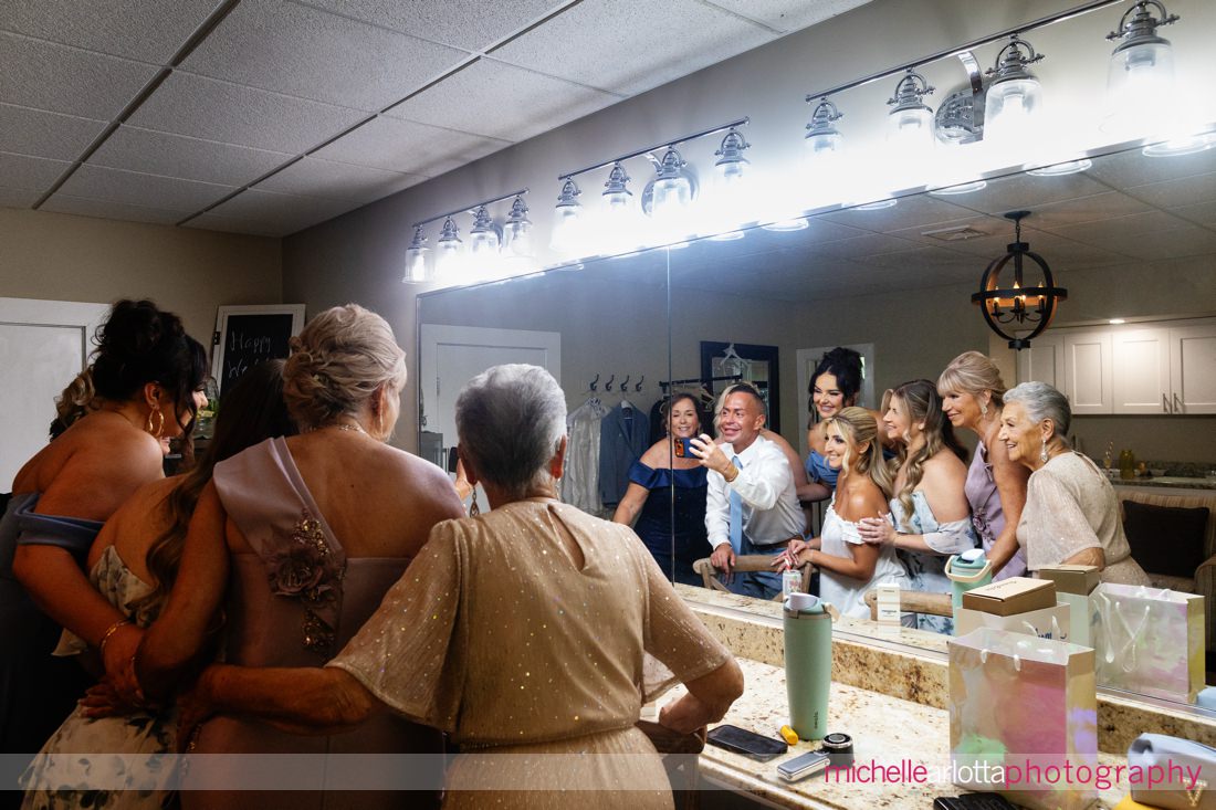 perona farms bride and crew taking selfie in mirror