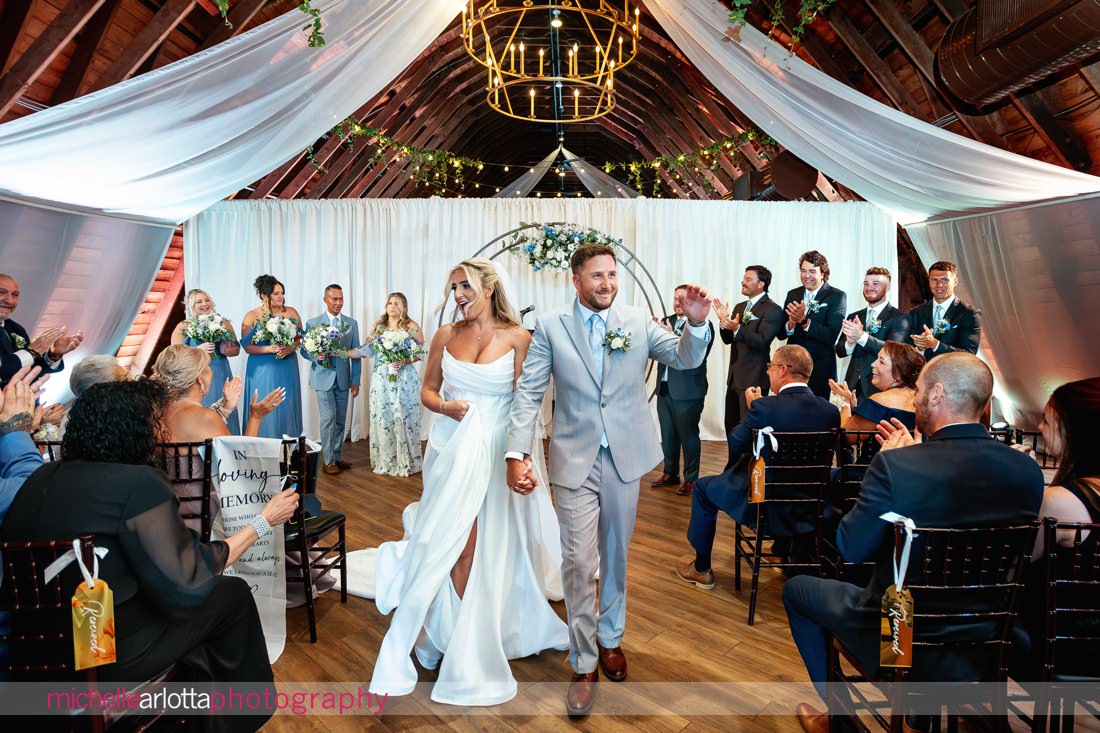 Perona Farms summer wedding ceremony bride and groom exit ceremony